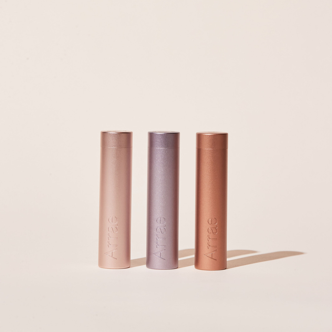 Arrae Carry-On Capsule Case Trio - 3 compact and durable tube-shaped travel cases designed to store up to 10 Arrae Capsules each.