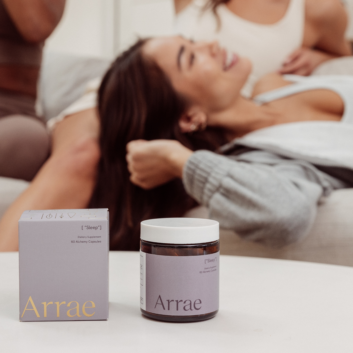 Arrae Sleep Supplement jar & box - A bottle of 60 capsules featuring a blend of natural ingredients, designed to promote restful sleep and relaxation without melatonin.