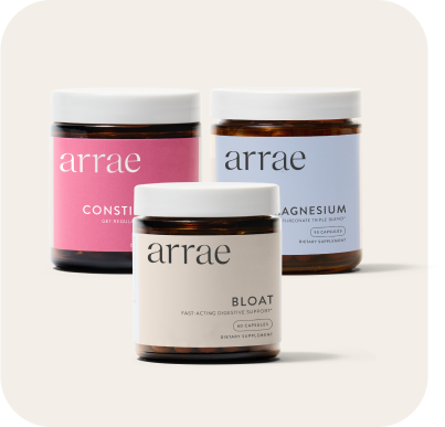 Three Arrae supplement jars are displayed: Constipation, Magnesium, and Bloat. The jars have soft pastel-colored labels and are arranged in a neat, clean layout. The background is light, creating a minimalist look.