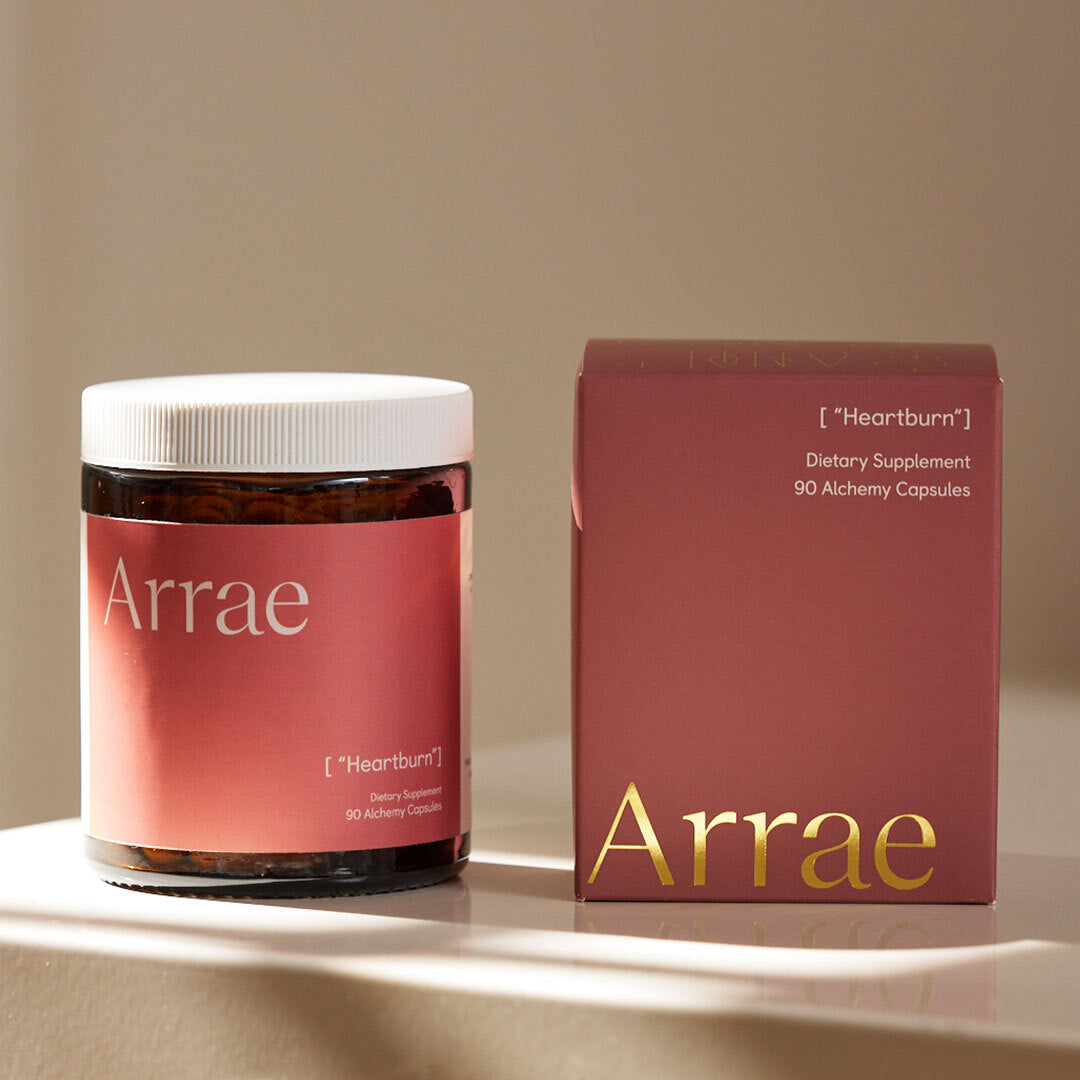 Arrae Heartburn Supplement jar next to box - A bottle of 90 capsules containing natural ingredients, designed to prevent heartburn and acid reflux in the moment and target the root cause for long-term relief.