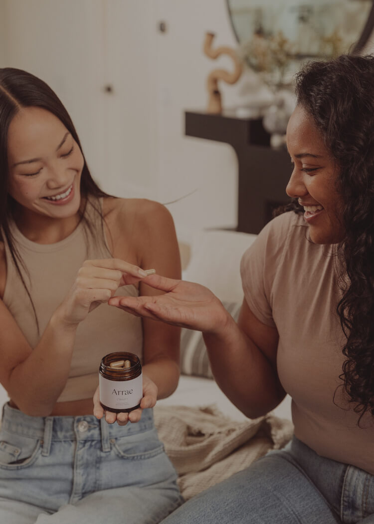 a woman shares an arrae capsule with her friend