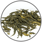 a pile of dehydrated green tea leaves
